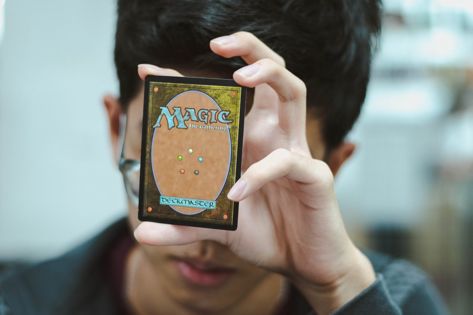 MTG Card Being Held Up By Person Aesthetic Image.
